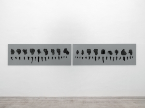 Gli scissi, 2010, polvere di mola, morchia raffreddata su legno, cm 80x240