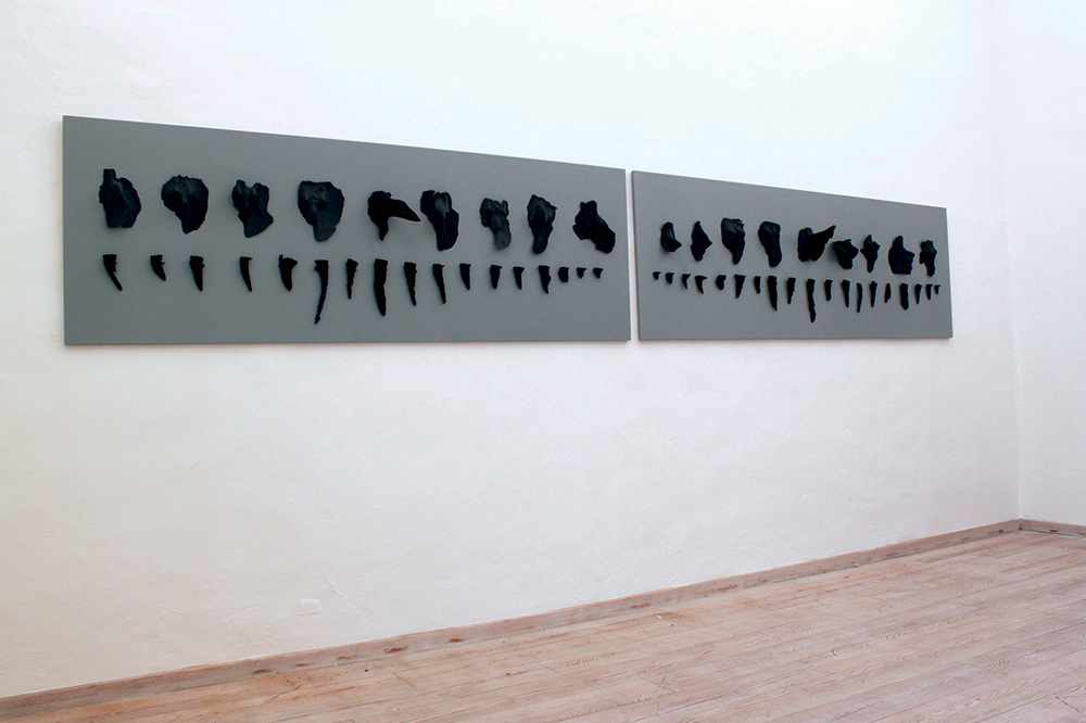 Gli scissi, 2010, polvere di mola, morchia raffreddata su legno, cm 80x240